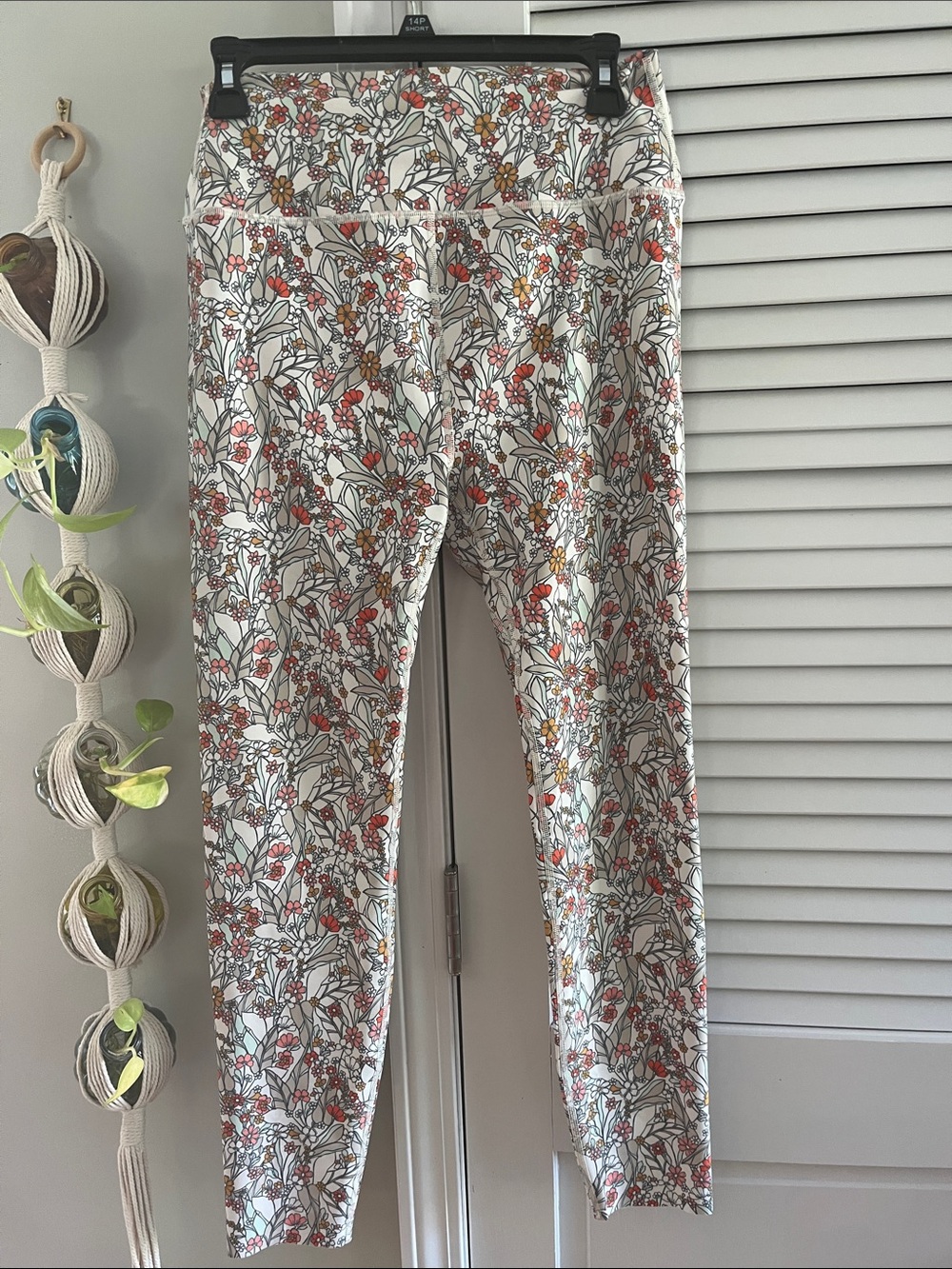 Peloton White Floral Print Leggings with Orange & Green Accents